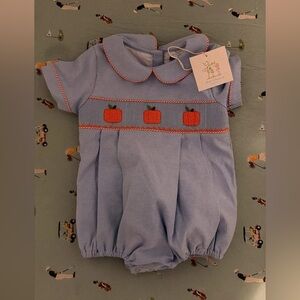 Blue Romper with Red Accents